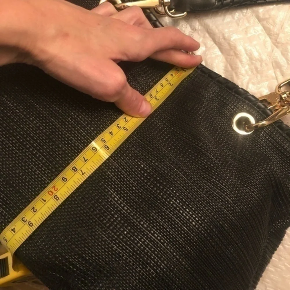 Michael kors black wicker tote bag with tassels and hangtag charm